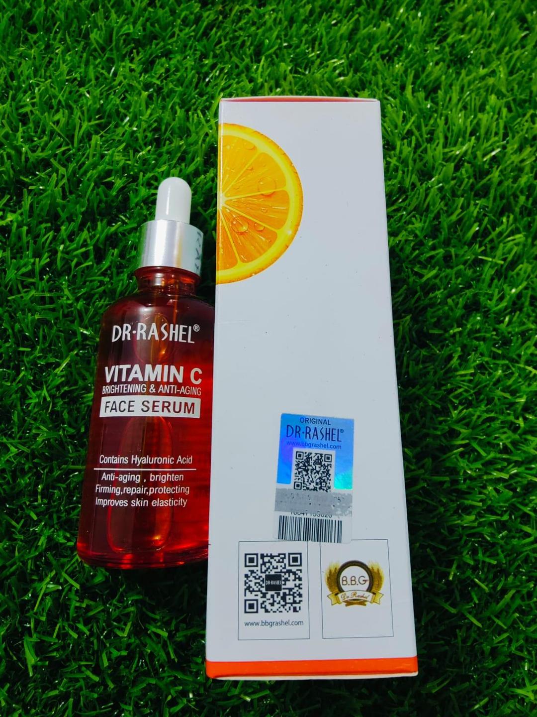 Dr. Rashel Vitamin C face serum bottle and box on grass