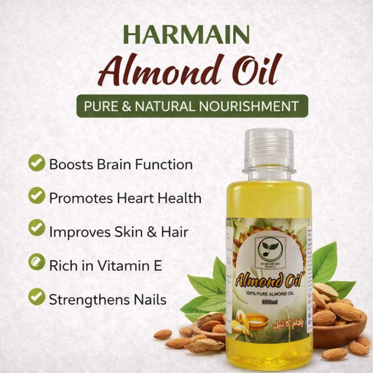 Bottle of Harmain Almond Oil with benefits listed on a white background