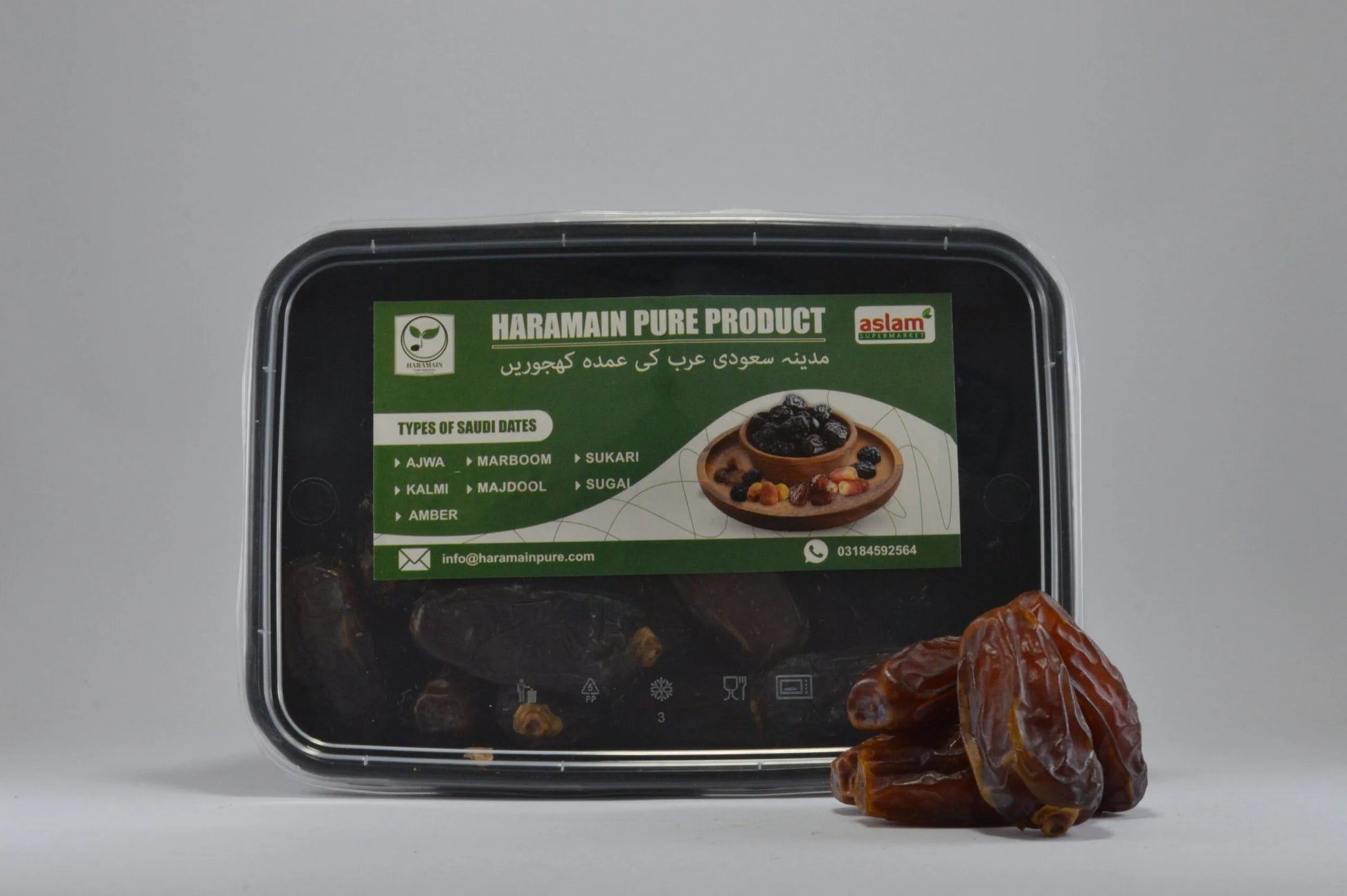 Haramain Pure Product packaging with dates on a gray background