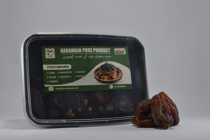 Haramain Pure Product packaging with dates on a gray background