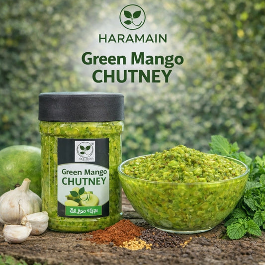 Jar and bowl of Haramain Green Mango Chutney with ingredients on a natural background