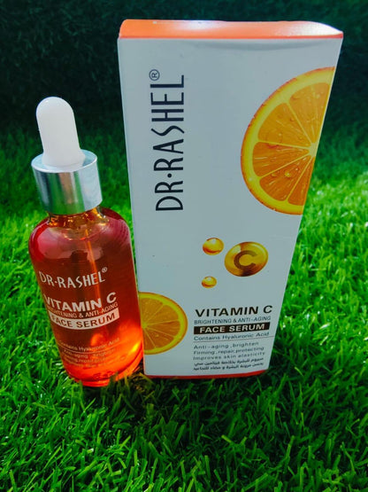 Dr. Rashel Vitamin C face serum bottle and packaging on grass