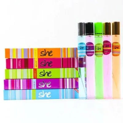 Colorful markers with 'she' branding on a white background