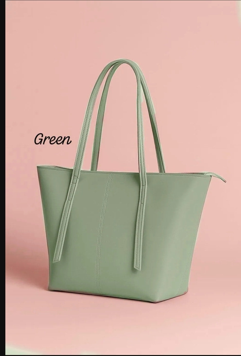 Green tote bag on a pink background
