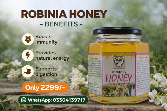 Jar of Robinia honey with benefits listed on a natural background