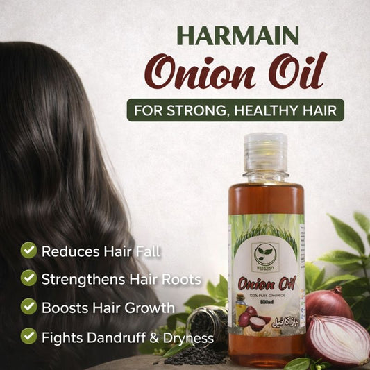 Harmain Onion Oil bottle with a woman's hair and onion ingredients on a light background
