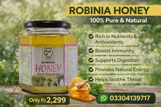 Jar of Robinia Honey with honeycomb and flowers on a wooden surface