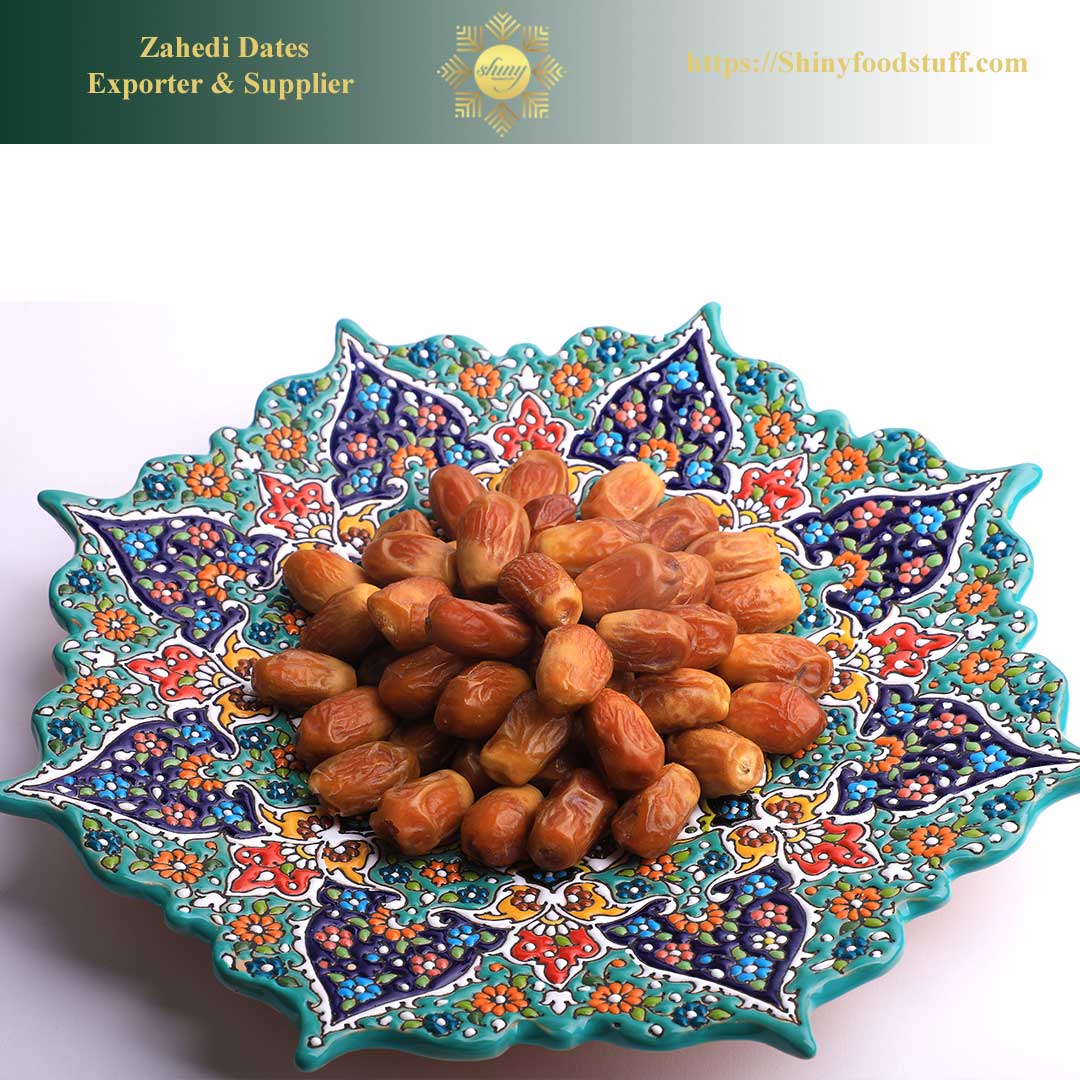Decorative bowl with dates and 'Zahedi Dates Exporter & Supplier' branding.